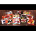 Selection of boxed Burago die-cast racing cars and