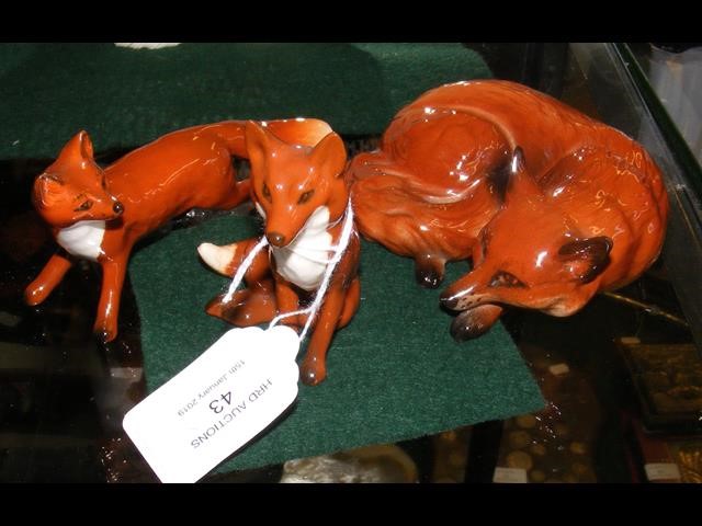 A Beswick Fox, together with two cubs