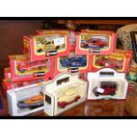 Boxed Burago die-cast racing cars, etc.