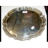 An early 20th century circular silver salver with