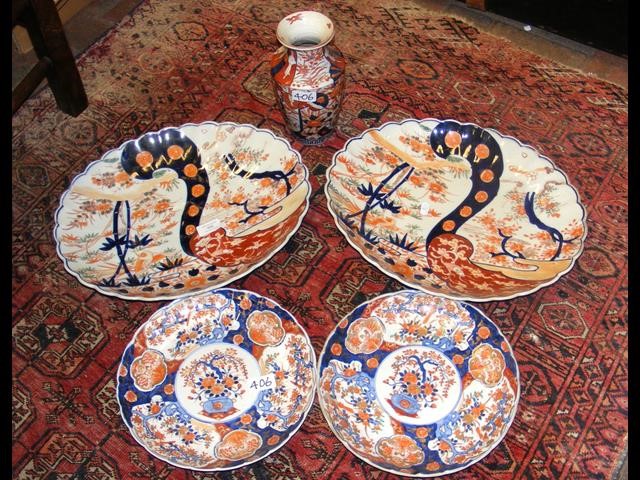 A pair of large oval Imari style antique plates -