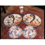 A pair of large oval Imari style antique plates -