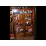 Antique pitch-pine two door display cabinet
