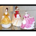 Royal Doulton figurine "Autumn Dawn" together with two others