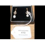 A pair of 9ct gold pearl drop earrings