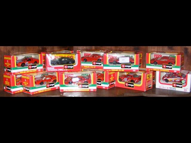 Selection of boxed Burago die-cast racing cars