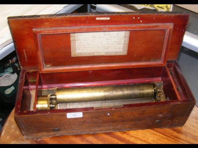 A Victorian cylinder music box playing on eight airs