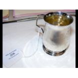 A small silver tankard, engraved "Admiral Ribouleau