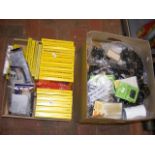 Two boxes containing model railway kits and train