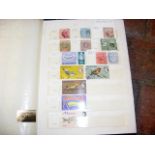 Nine albums of collectable stamps, including Cayma