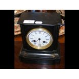 A 20cm high striking Victorian slate mantel clock