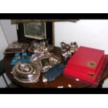 Selection of silver plated ware, place mats