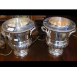 A pair of 26cm high decorative silver plated wine
