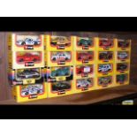 A large selection of 20 boxed Burago die-cast vehicle