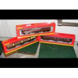 A boxed Hornby First Class Coach, together with tw