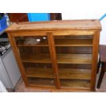 An oak two door display cabinet