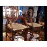 Set of eight antique style dining chairs with shie