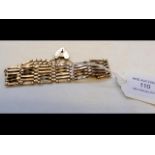 A lady's 9ct gold gate bracelet