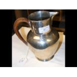 A silver jug by Henry John Lias & James Wakely,