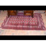 A Middle Eastern style rug with geometric border - 180cm