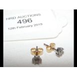 A pair of 18ct gold diamond stud earrings - approx