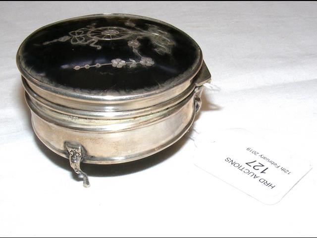 A silver inlaid circular trinket box - 7cm