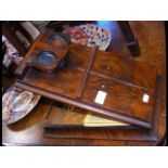 A Victorian figured walnut stereo viewer with card