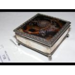 A 7cm square silver inlaid trinket box - the leather