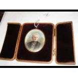 Oval miniature of lady in travelling case - 7.5cm