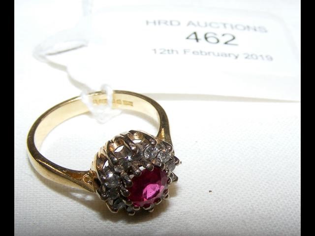 An 18ct gold ruby and diamond ring