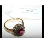 An 18ct gold ruby and diamond ring