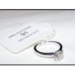 A diamond Solitaire ring in 18ct white gold settin