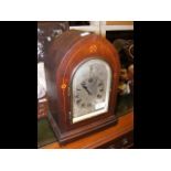 A 36cm high lancet shaped striking mantel clock wi