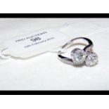 A diamond cluster crossover ring - approx. 1ct tot