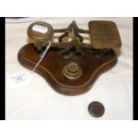 Set of antique postal scales with weights
