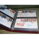 An album containing GB First Day Covers and miscel