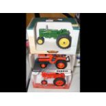 Three die-cast model tractors - boxed