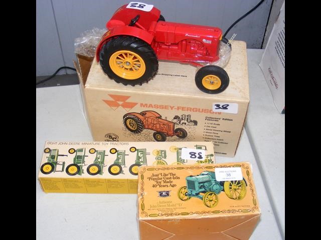 Eight John Deere Miniature Toy Tractors in origina