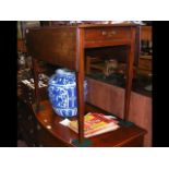 A 19th century mahogany Pembroke table