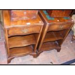 A pair of serpentine fronted mahogany bedside ches