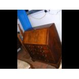 A Georgian walnut bureau with fitted interior and