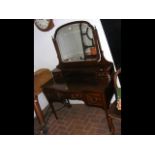 An Edwardian dressing table with mirror over