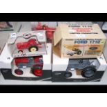 Two Massey Ferguson model tractors in original box