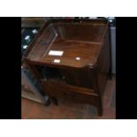 A Georgian mahogany tray top commode with tambour