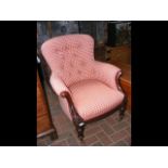 A William IV button back easy chair