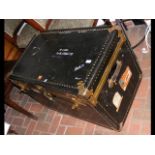 An Overland studded travelling trunk with vintage