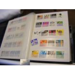 Album containing GB stamps, including sheets and m