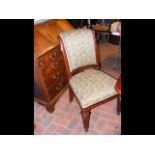 A set of four Victorian dining chairs with upholst