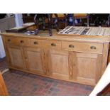 A 19th century pine dresser with three drawers and