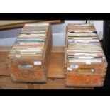 Two vintage bottle crates containing 45 rpm record